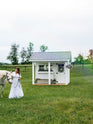 Dream Coop.  Chicken Coop with Porch.  The Cutest Coop.  Luxury Chicken Coop.  Designer Chicken Coops