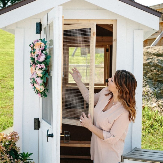 Walk-in Chicken Coop.  White Chicken Coop.  Farmhouse Chicken Coop.  Classic Chicken Coop by Cutest Coops